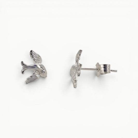 Sterling silver swallow stud earrings side view.