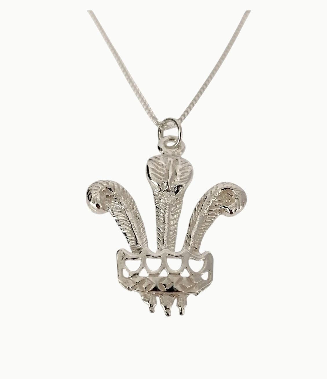 Sterling silver prince of wales feathers pendant on a 22" 1.7mm wide sterling silver belcher link chain.