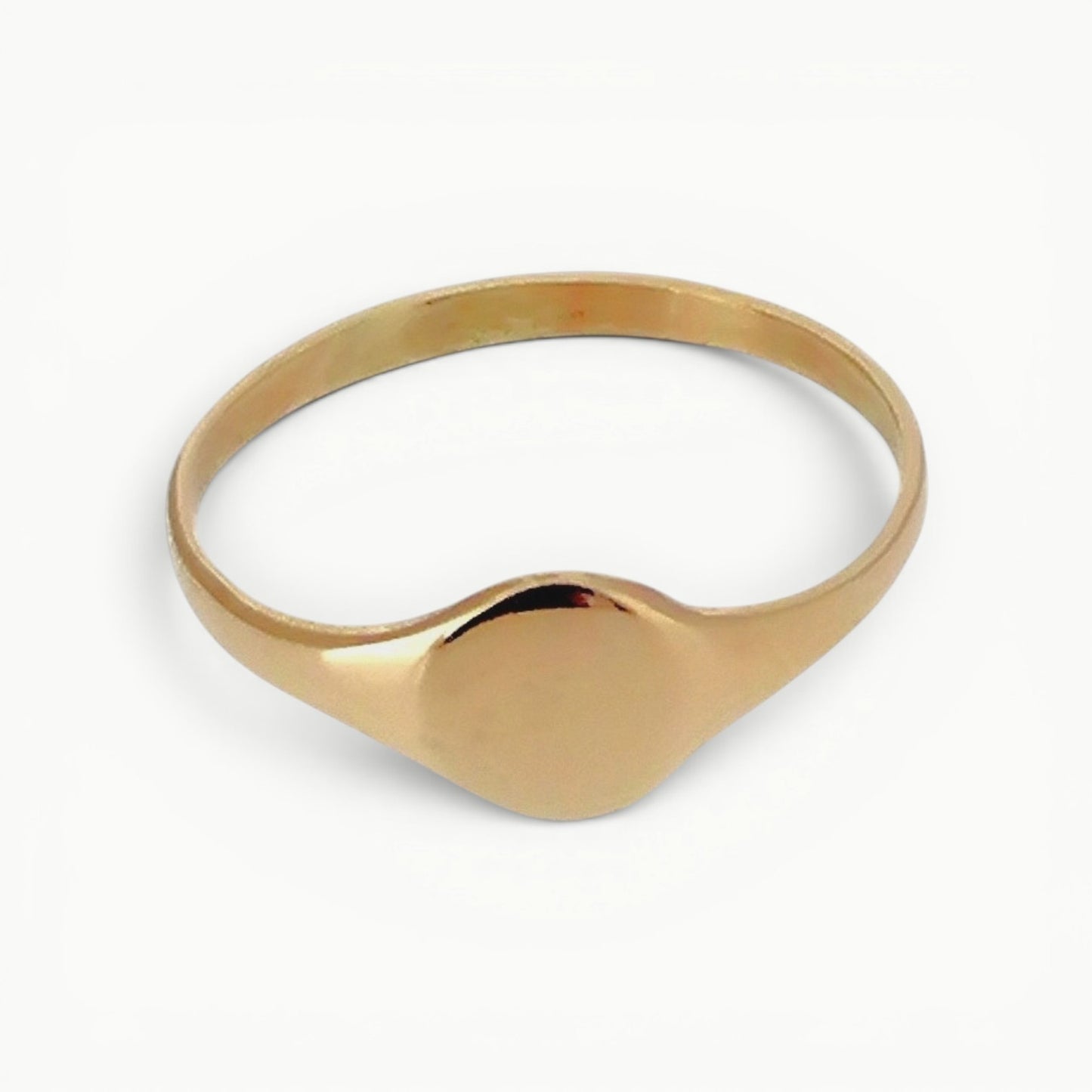 Ladies 9ct yellow gold dainty minimalist round signet ring with a highly polished finish 