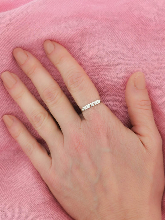 Sterling Silver Nanna Band Ring worn on models hand