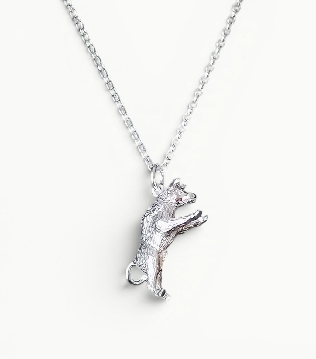 Sterling silver bull pendant on a 22" 1.7mm wide sterling silver belcher link chain. Symbol of strength and fertility. 