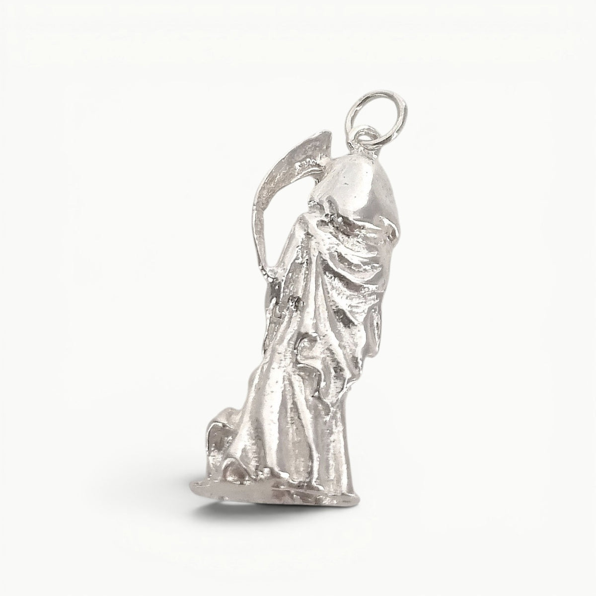Reverse view of sterling silver grim reaper pendant.