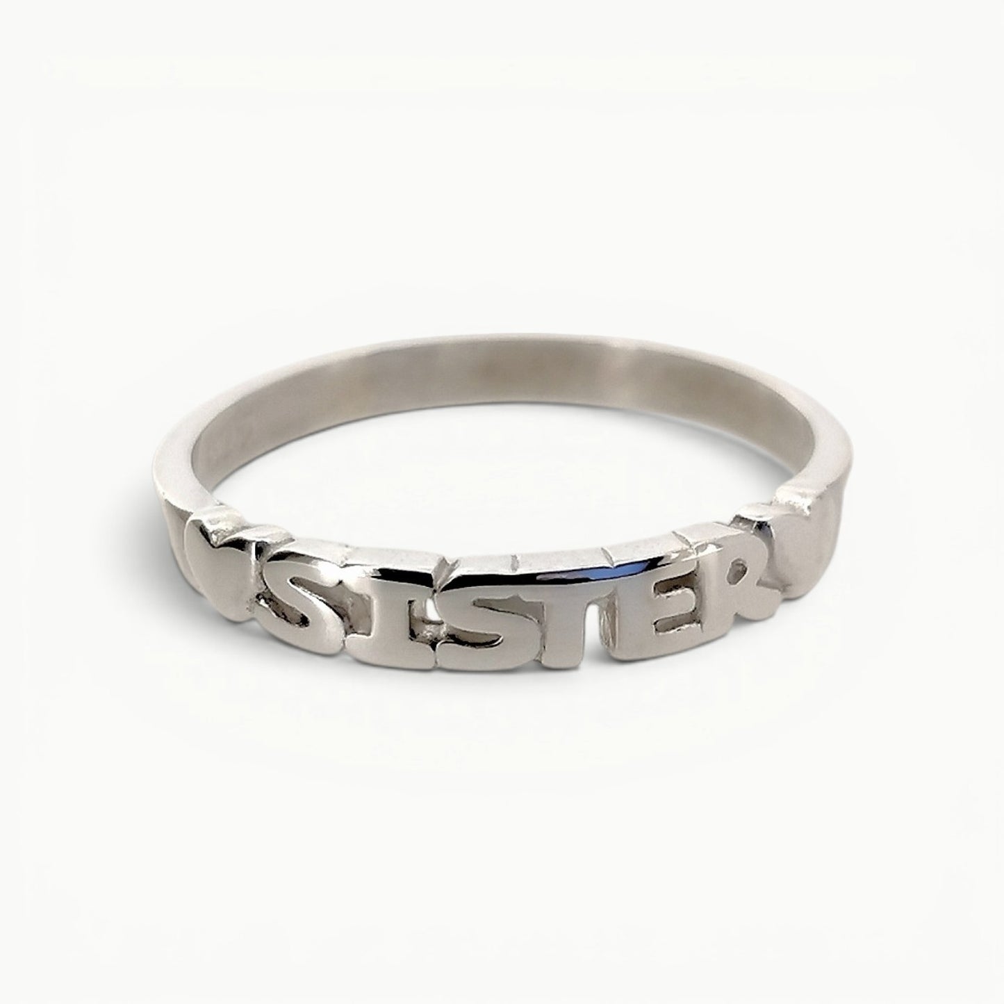 Sterling silver sister word band ring with featured hearts