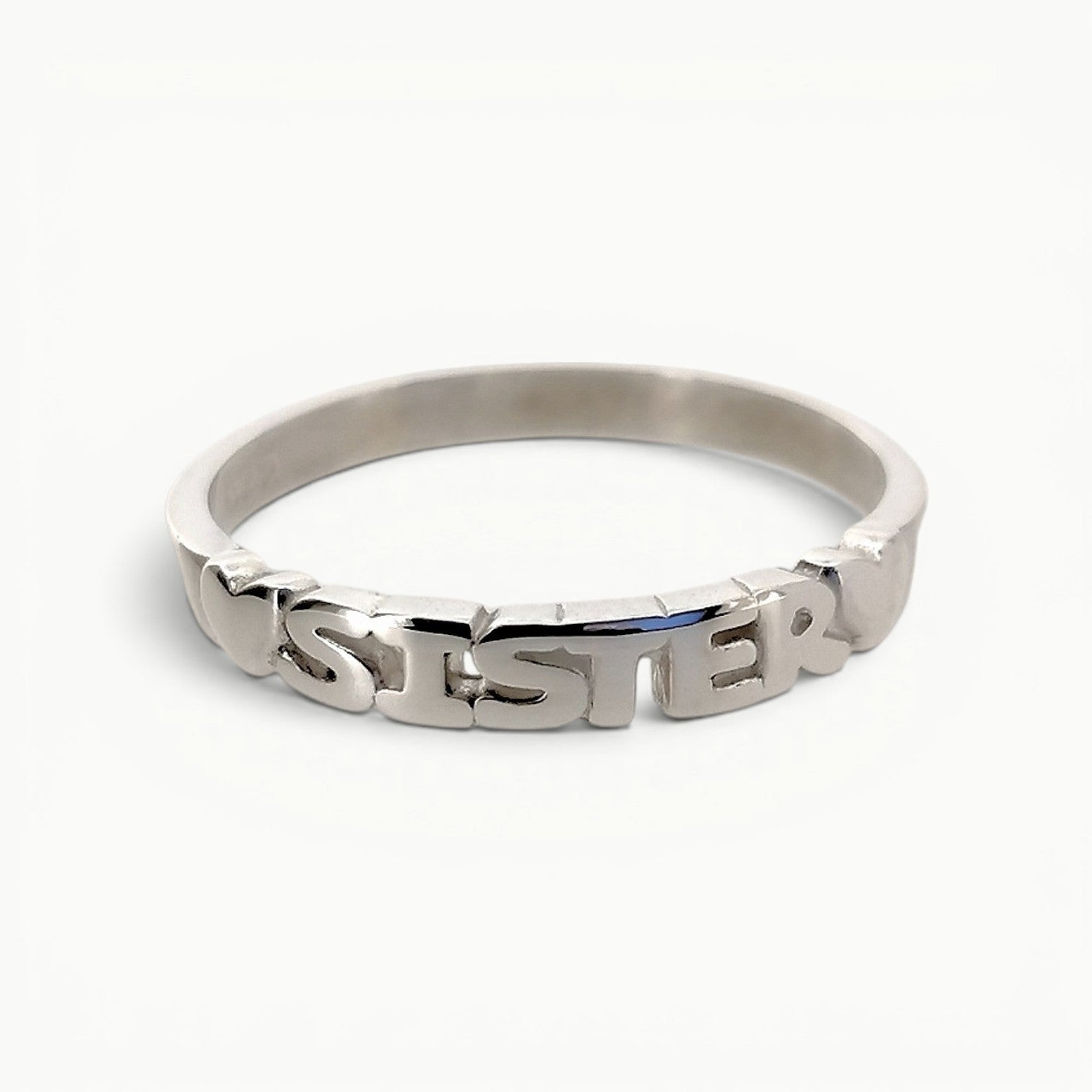 Sterling silver sister word band ring with featured hearts