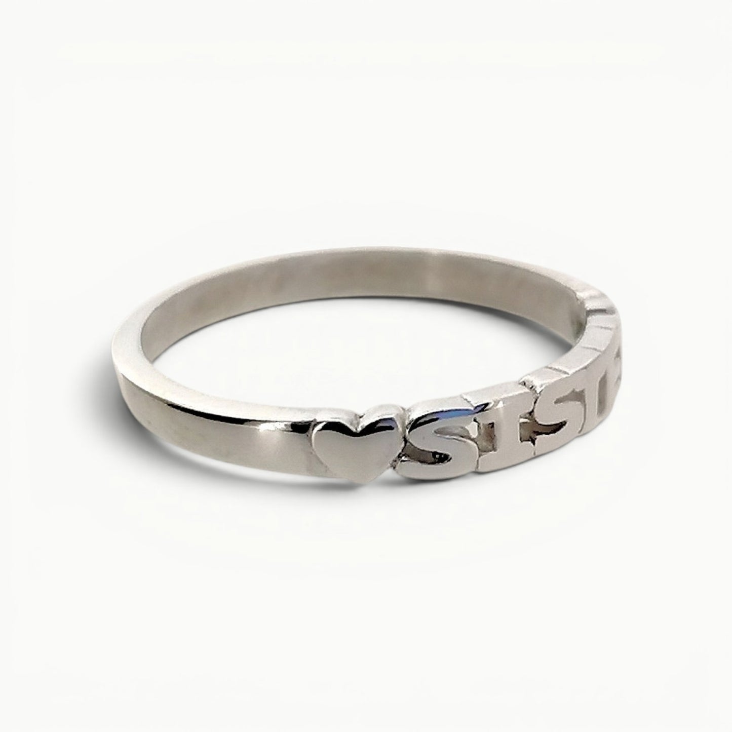 Side view of sterling silver sister band ring with hearts