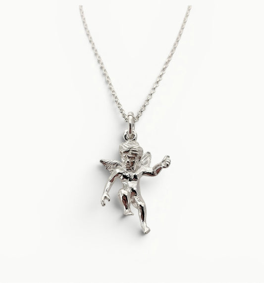 Sterling silver cherub charm pendant on a 20" 1.4mm wide belcher. 