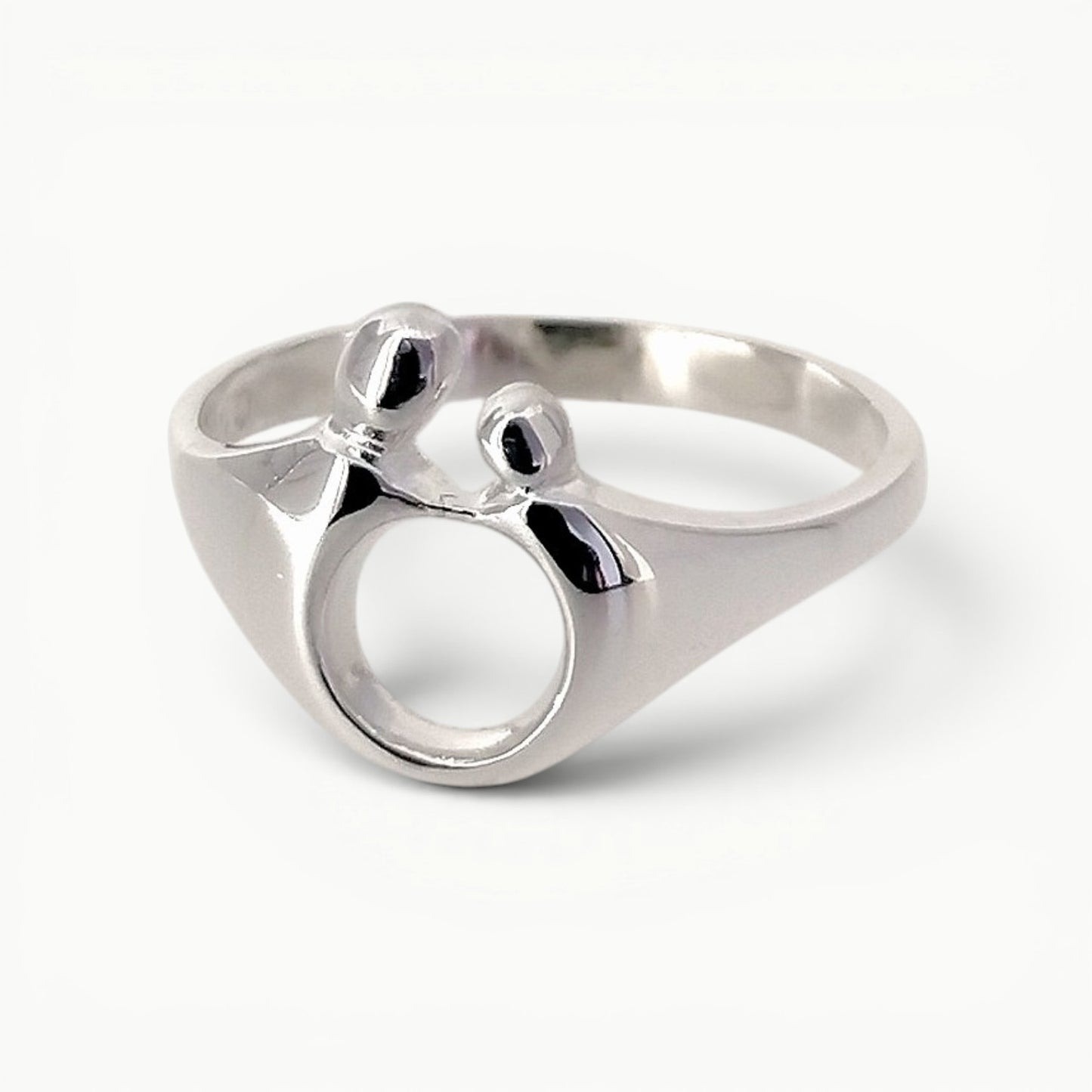 Sterling silver Mother and Child ring with a highly polished finish 