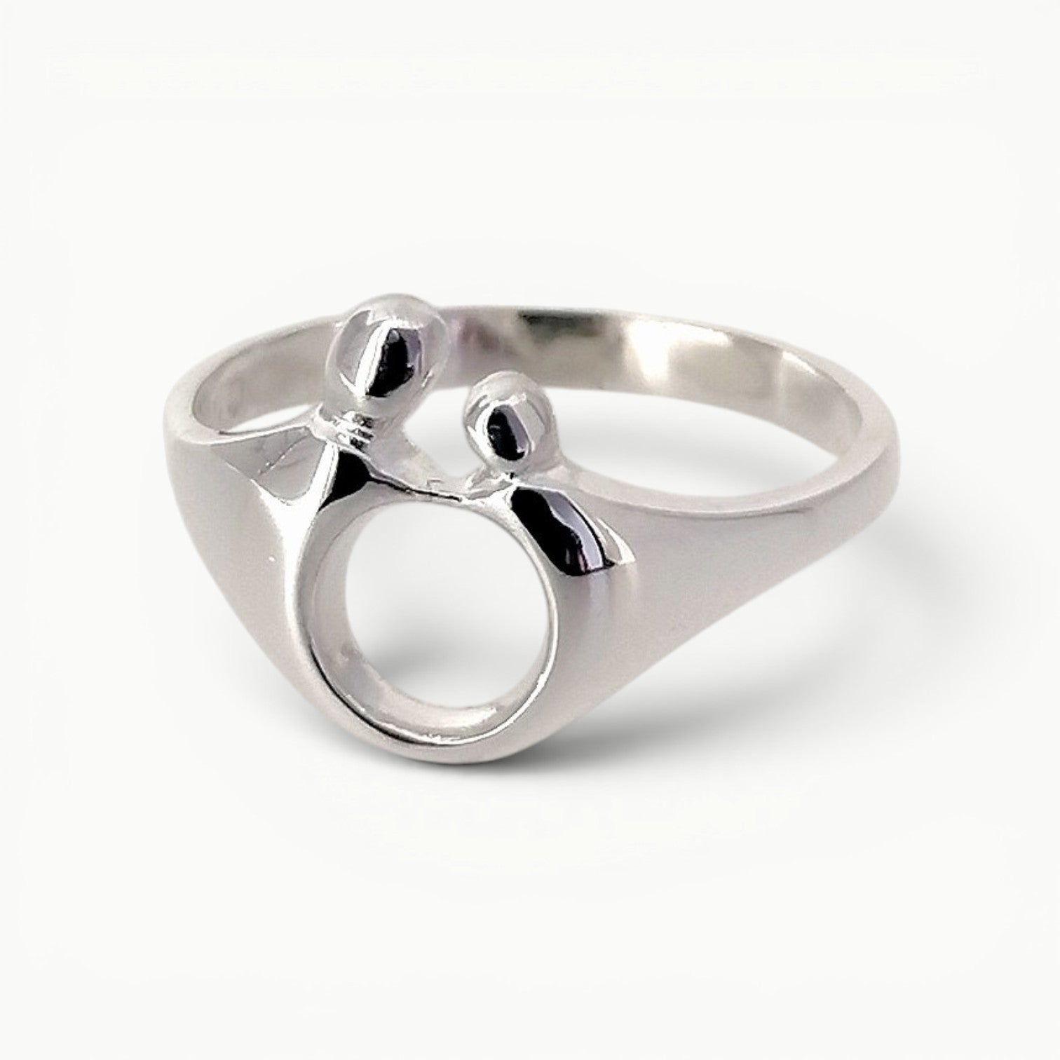Sterling silver Mother and Child ring with a highly polished finish 
