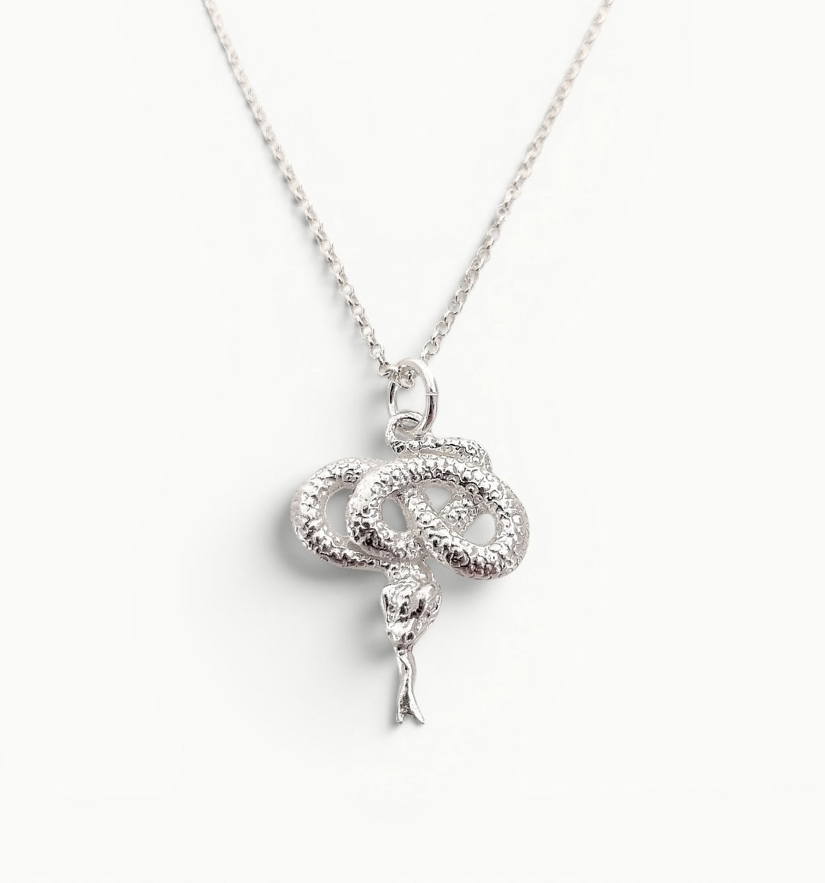 Sterling Silver coiled snake pendant on a 20" 1.4mm wide belcher link chain. 