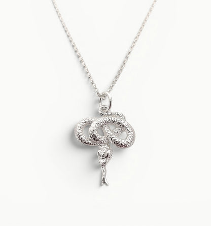 Sterling Silver coiled snake pendant on a 20" 1.4mm wide belcher link chain. 