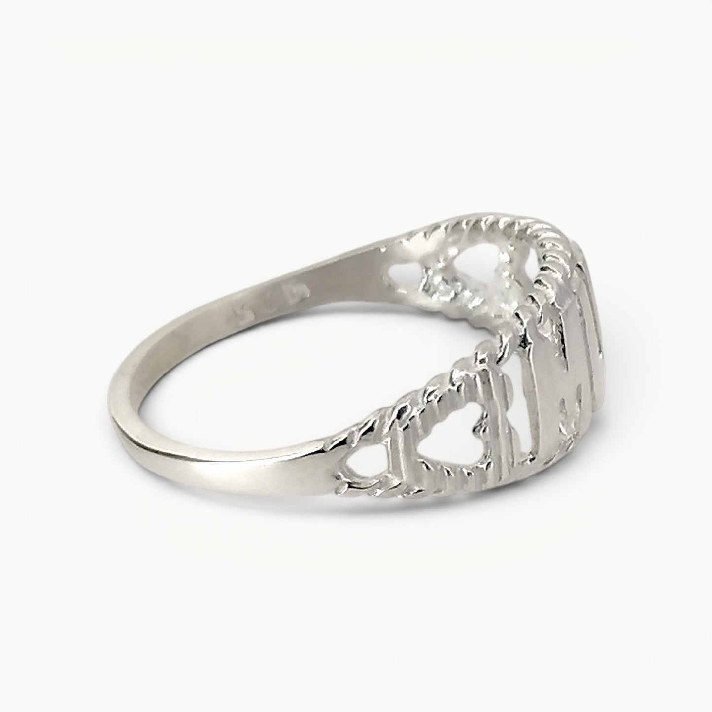 Side view of sterling silver Mum ring with featured hearts 
