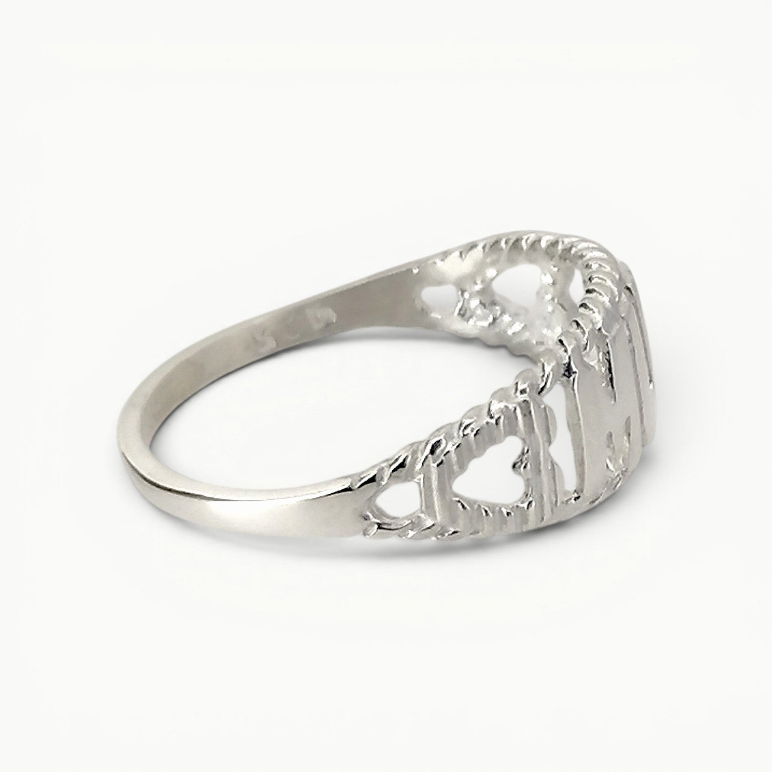 Side view of sterling silver Mum ring with featured hearts 