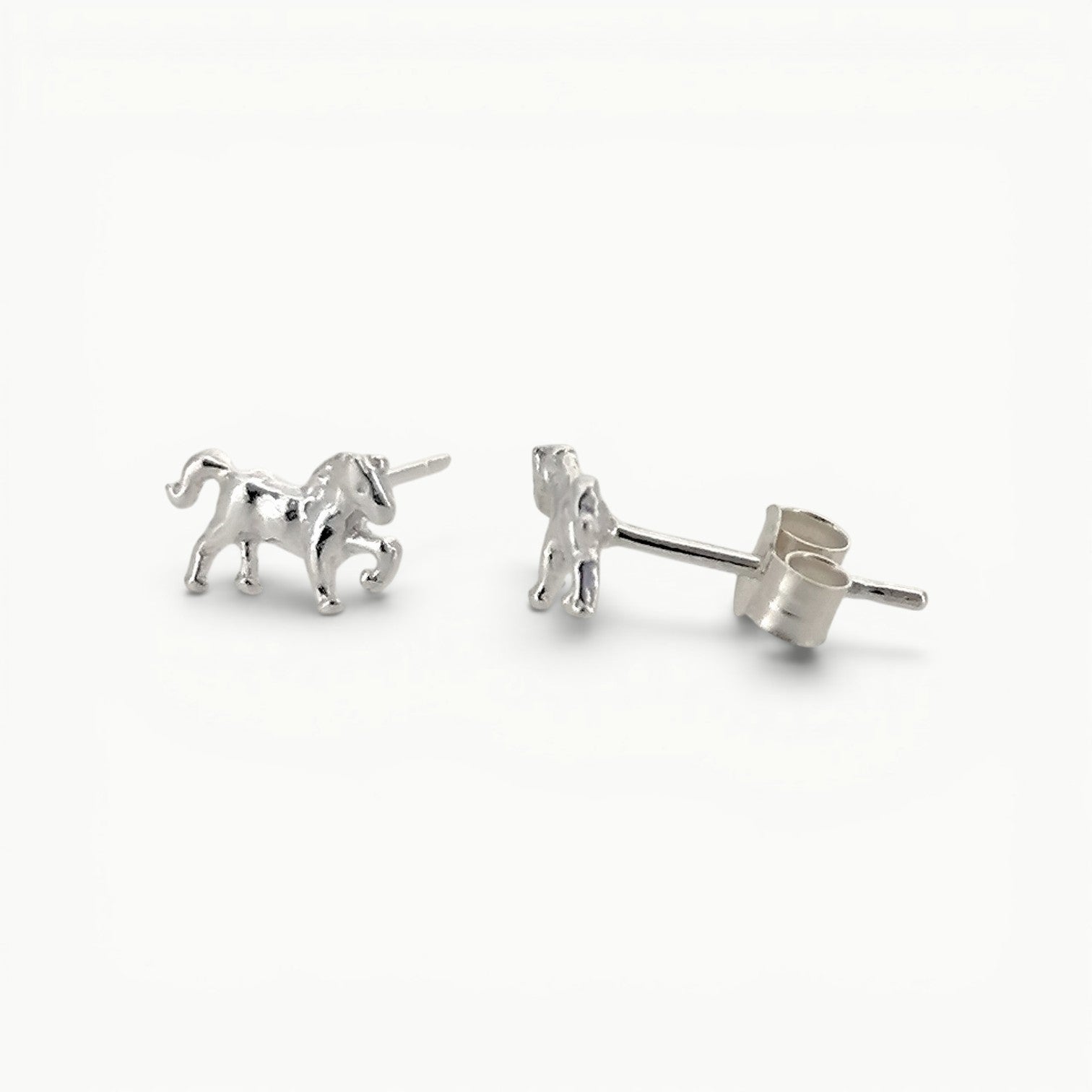 Sterling Silver small horse pony stud earrings side view. 