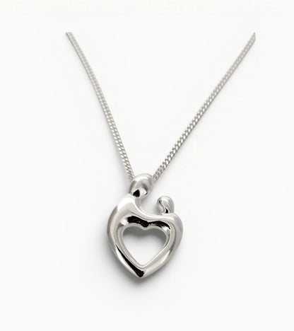 Sterling silver Mother and Child heart shape pendant. 