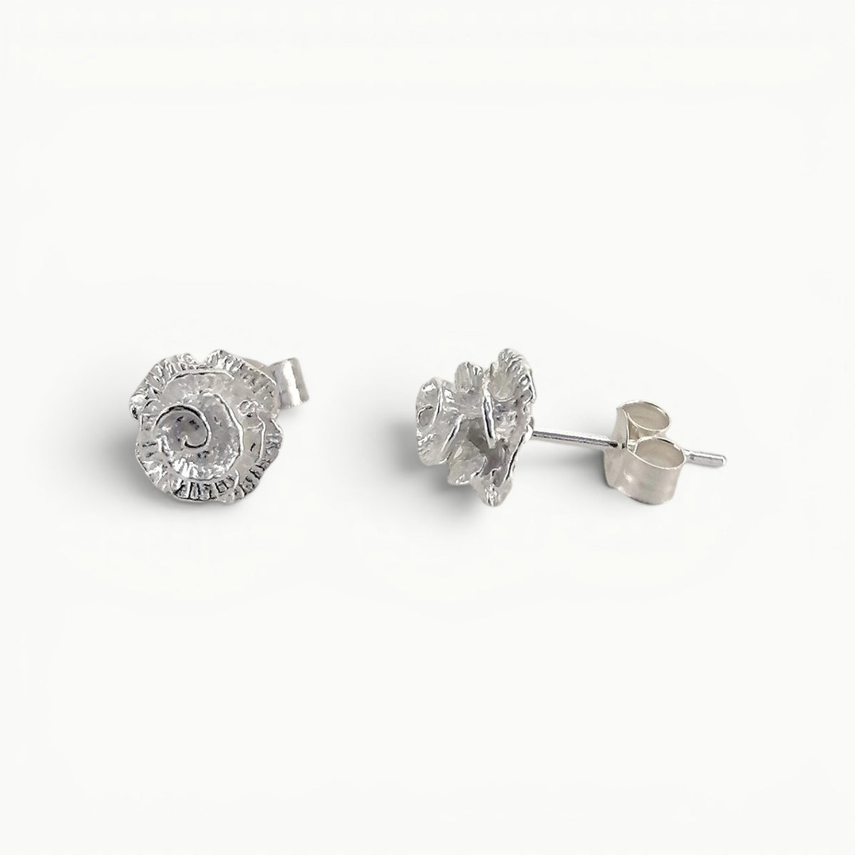 Sterling silver English rose flower stud earrings side view. 