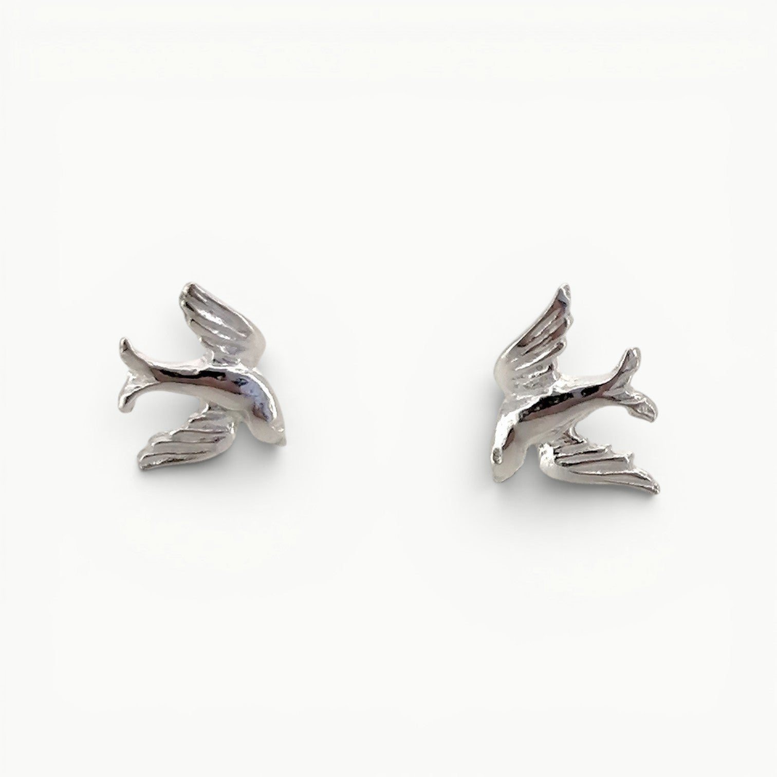 Sterling silver swallow stud earrings. 