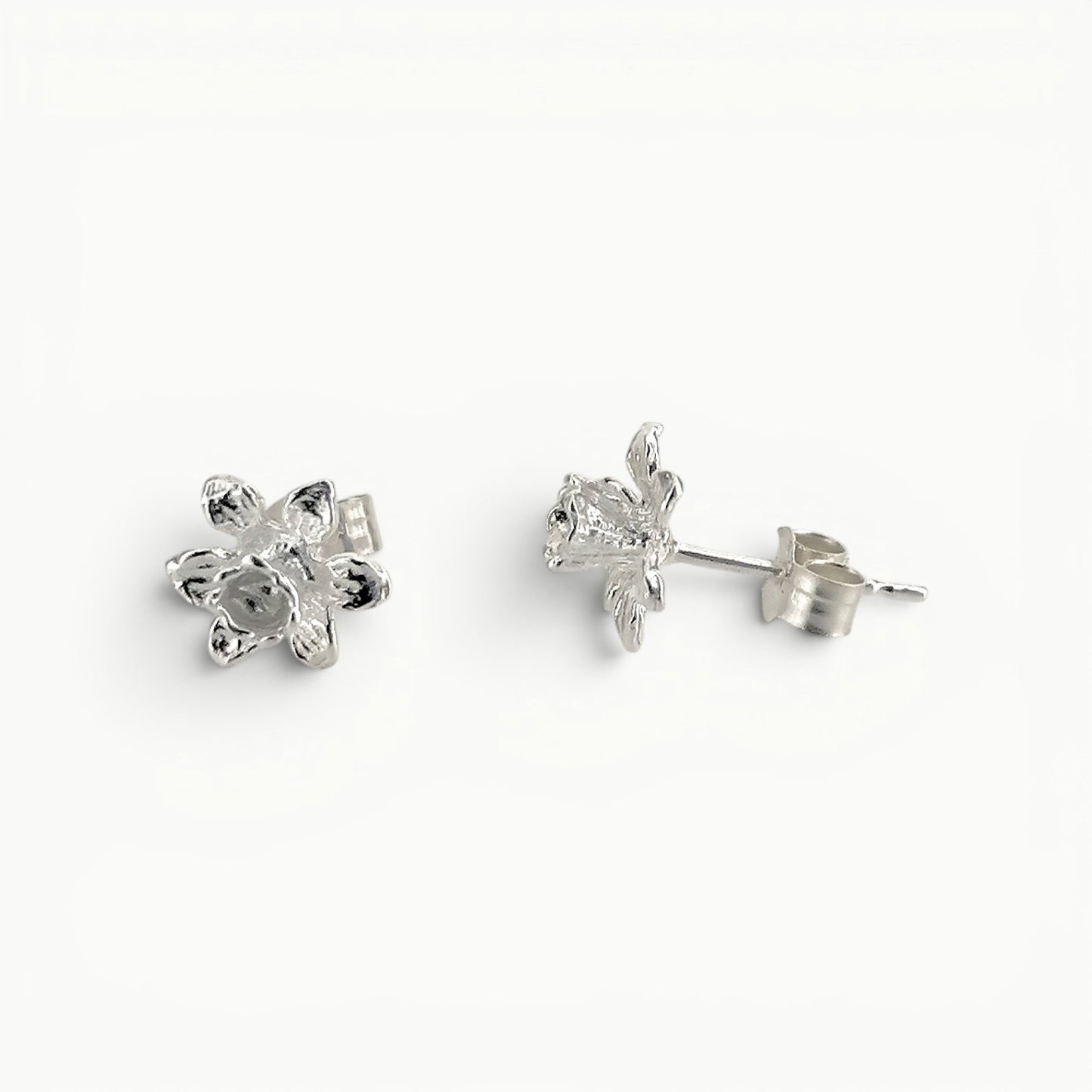 Sterling silver daffodil stud earrings side view. 