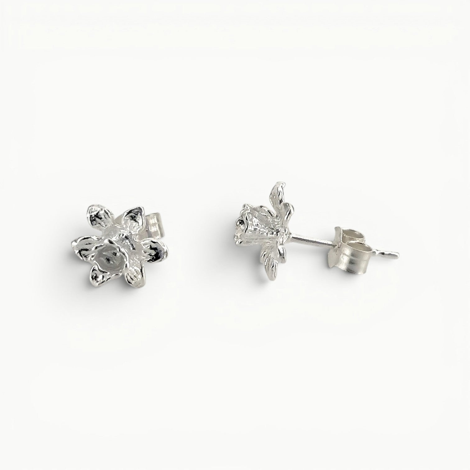 Sterling silver daffodil stud earrings side view. 