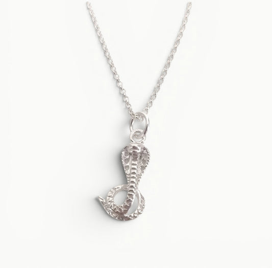 Sterling silver cobra pendant on a 22" belcher chain 