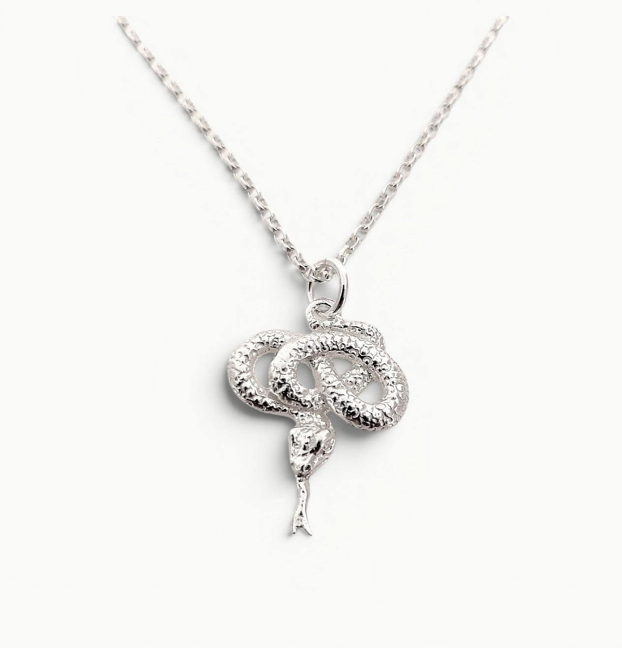 Sterling Silver coiled snake pendant on a 22" 1.7mm wide belcher link chain. 