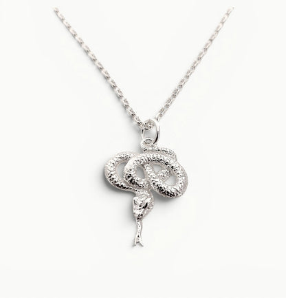 Sterling Silver coiled snake pendant on a 22" 1.7mm wide belcher link chain. 