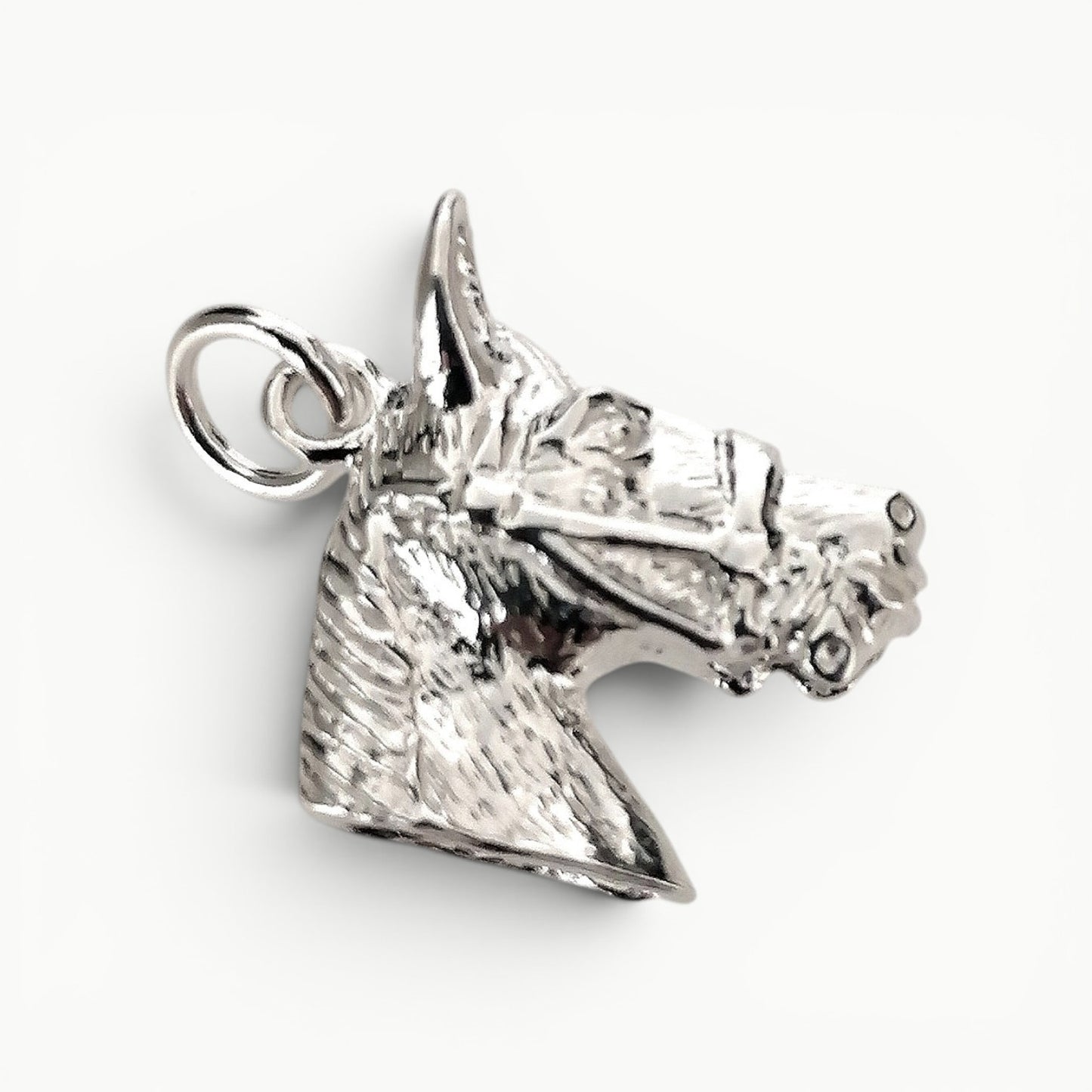 Sterling silver horse head charm pendant.