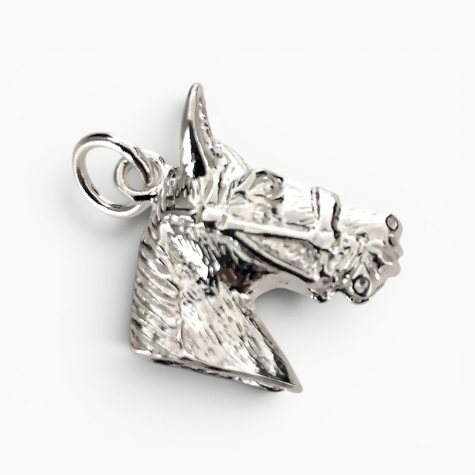 Sterling silver horse head charm pendant.