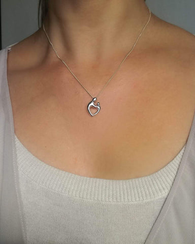Sterling silver mother and child best sale necklace