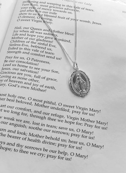 Meaning of Miraculous Mary Medal Symbol Pendant